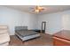 Simple bedroom with a double bed, dresser, and mirror at 40 Bixler Rd, Indianapolis, IN 46227