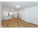 Remodeled kitchen with white cabinets, new appliances, and vinyl flooring at 728 E Beecher St, Indianapolis, IN 46203