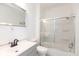 Clean bathroom with a shower/tub combo and gray vanity at 728 E Beecher St, Indianapolis, IN 46203