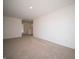 Spacious bonus room with neutral carpeting and plenty of natural light at 168 Velvet Hat Rd, Danville, IN 46122