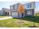 Two-story brick home with gray accents and an attached garage at 168 Velvet Hat Rd, Danville, IN 46122