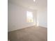 Well-lit bedroom with large window and neutral carpet at 168 Velvet Hat Rd, Danville, IN 46122