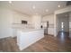 Modern kitchen with white cabinets, stainless steel appliances, and an island at 168 Velvet Hat Rd, Danville, IN 46122