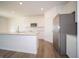 Modern kitchen with white cabinets and stainless steel appliances at 168 Velvet Hat Rd, Danville, IN 46122