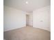 Spacious bedroom with neutral walls and carpet, plus a double door closet at 168 Velvet Hat Rd, Danville, IN 46122