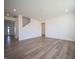 Bright living room with wood-look floors and lots of natural light at 168 Velvet Hat Rd, Danville, IN 46122
