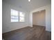 Spacious living room with hardwood floors and large windows at 168 Velvet Hat Rd, Danville, IN 46122
