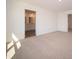 Spacious bedroom with en-suite bathroom access and carpet at 168 Velvet Hat Rd, Danville, IN 46122