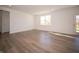 Spacious basement with large windows and wood-look flooring at 168 Velvet Hat Rd, Danville, IN 46122