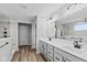 Elegant bathroom with double vanity, large shower, and modern fixtures at 4959 Amber Crest Dr, Brownsburg, IN 46112