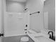 Clean bathroom with a shower/tub combo and modern vanity at 4959 Amber Crest Dr, Brownsburg, IN 46112