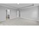 Spacious bedroom with plush carpeting and an ensuite bathroom at 4959 Amber Crest Dr, Brownsburg, IN 46112