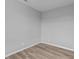 Simple bedroom with gray walls and vinyl plank flooring at 4959 Amber Crest Dr, Brownsburg, IN 46112