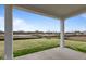 Covered porch with view of new construction homes and green space at 4959 Amber Crest Dr, Brownsburg, IN 46112