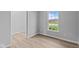 Bright office features light gray walls, vinyl flooring, and a large window at 4959 Amber Crest Dr, Brownsburg, IN 46112