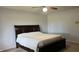 Main bedroom with dark wood furniture and carpeted floors at 4101 N County Road 500 W, Muncie, IN 47304