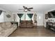Bright living room with hardwood floors and comfortable furniture at 941 N 500 W, Columbus, IN 47201