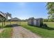 Property features two sheds and a carport at 941 N 500 W, Columbus, IN 47201