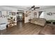 Open living room with hardwood floors and kitchen view at 941 N 500 W, Columbus, IN 47201