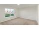 Spacious bedroom with window overlooking backyard at 134 Maxim Ct, Cumberland, IN 46229