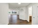 Bright entryway with hardwood floors and views to living area at 134 Maxim Ct, Cumberland, IN 46229