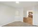 Open dining room with archway leading to modern kitchen at 134 Maxim Ct, Cumberland, IN 46229