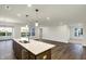 Modern kitchen with island, stainless steel appliances, and white quartz countertops at 134 Maxim Ct, Cumberland, IN 46229