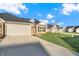 Two-car garage and ranch style home at 134 Maxim Ct, Cumberland, IN 46229