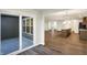 View of kitchen and dining area with sliding glass doors to patio at 134 Maxim Ct, Cumberland, IN 46229