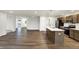Open concept kitchen features an island and stainless steel appliances at 134 Maxim Ct, Cumberland, IN 46229