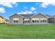 Spacious backyard with large patio and beautiful lawn at 134 Maxim Ct, Cumberland, IN 46229