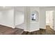 Elegant hallway with hardwood floors and an arched niche at 134 Maxim Ct, Cumberland, IN 46229