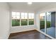 Bright sunroom with sliding glass doors leading to a patio at 134 Maxim Ct, Cumberland, IN 46229