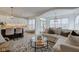 Open concept living room with view to kitchen and dining area at 729 Greenford N Trl, Carmel, IN 46032