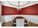 Bright dining room with red walls and white trim at 6275 Canak Dr, Avon, IN 46123