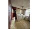 Laundry room with washer, dryer, and access to bathroom at 108 N Summit St, Summitville, IN 46070