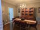 Dining room with hardwood floors and a lovely chandelier at 10870 Picket Fence Pl, Fishers, IN 46037