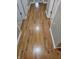 Hardwood floor hallway with access to bedrooms at 10870 Picket Fence Pl, Fishers, IN 46037