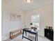 Home office with a desk, chair, and world map art at 3923 Windstar Way, Columbus, IN 47203