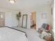 Well-lit bedroom with access to a private bathroom at 3923 Windstar Way, Columbus, IN 47203
