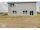 Gray house exterior with a large backyard at 3923 Windstar Way, Columbus, IN 47203