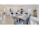 Kitchen and dining area with gray table and chairs, stainless steel appliances at 3923 Windstar Way, Columbus, IN 47203