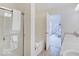 Clean bathroom with shower/tub combo and double vanity at 3923 Windstar Way, Columbus, IN 47203