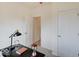 Simple home office with a desk, chair, and ample closet space at 3923 Windstar Way, Columbus, IN 47203