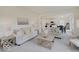 Bright and airy living room with comfortable seating and kitchen view at 3923 Windstar Way, Columbus, IN 47203