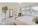 Bright and airy bedroom with carpeted floors and lots of natural light at 3923 Windstar Way, Columbus, IN 47203