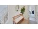 Entryway with bench and mirror, leading to another room at 3923 Windstar Way, Columbus, IN 47203