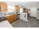 Efficient kitchen with ample counter space and wooden cabinets at 4620 Whitham Ln, Indianapolis, IN 46237