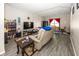 Spacious living room featuring a large sofa and flat-screen TV at 4620 Whitham Ln, Indianapolis, IN 46237