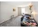 Simple bedroom with window and a desk at 4620 Whitham Ln, Indianapolis, IN 46237